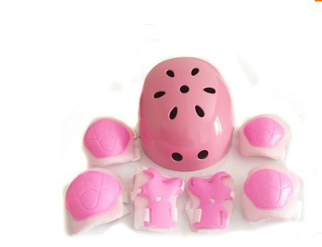 a pink helmet with pads on it