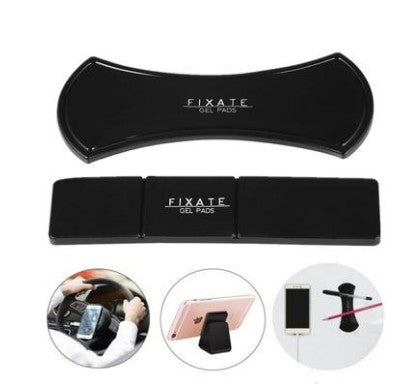 a black cell phone pad with a phone in the middle