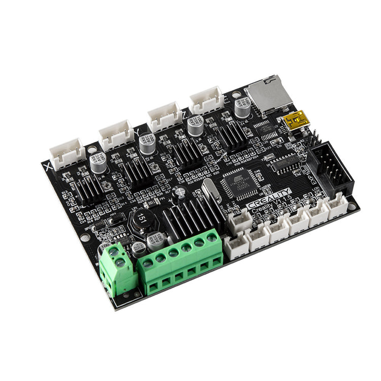 a black circuit board with white and green connectors