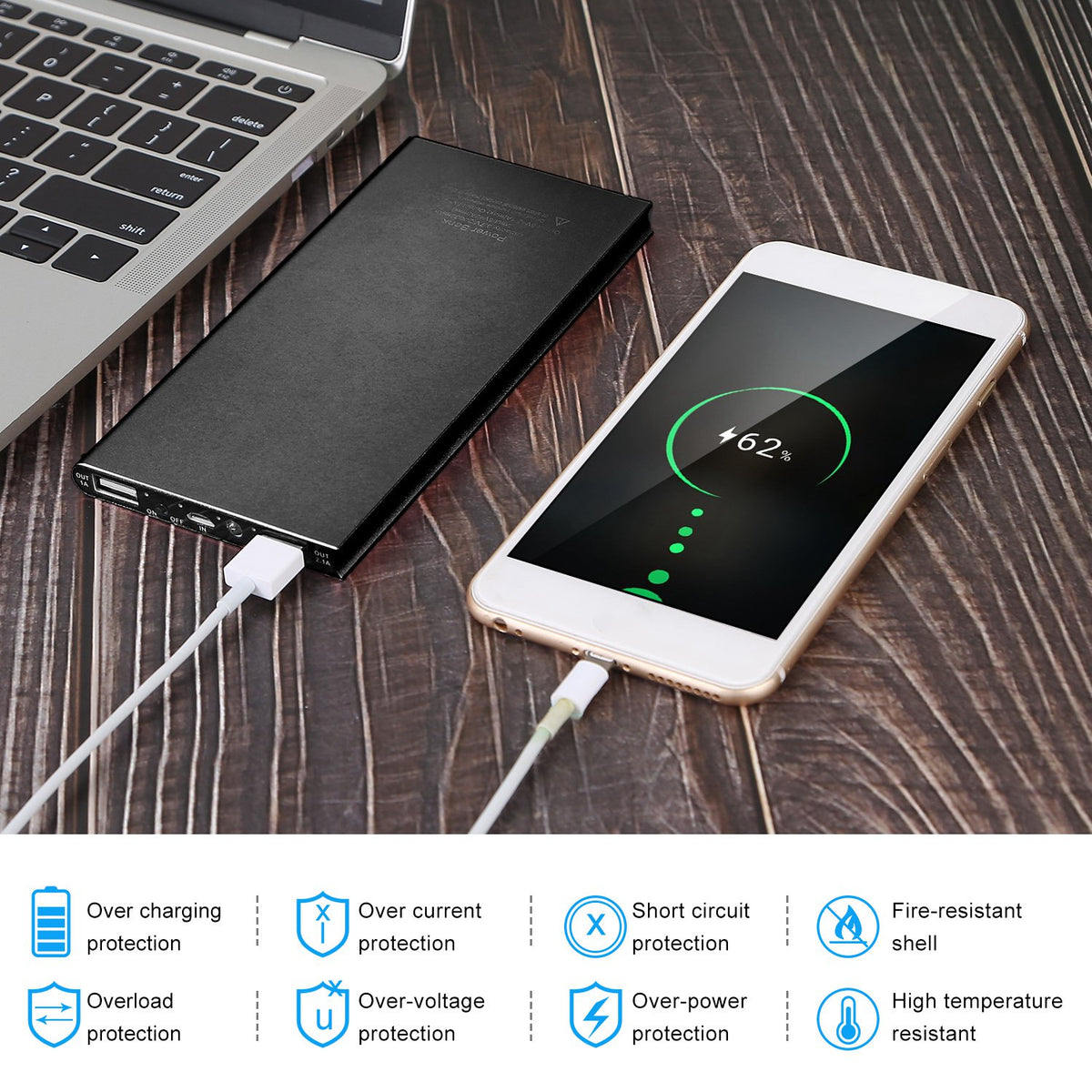a phone charging a laptop