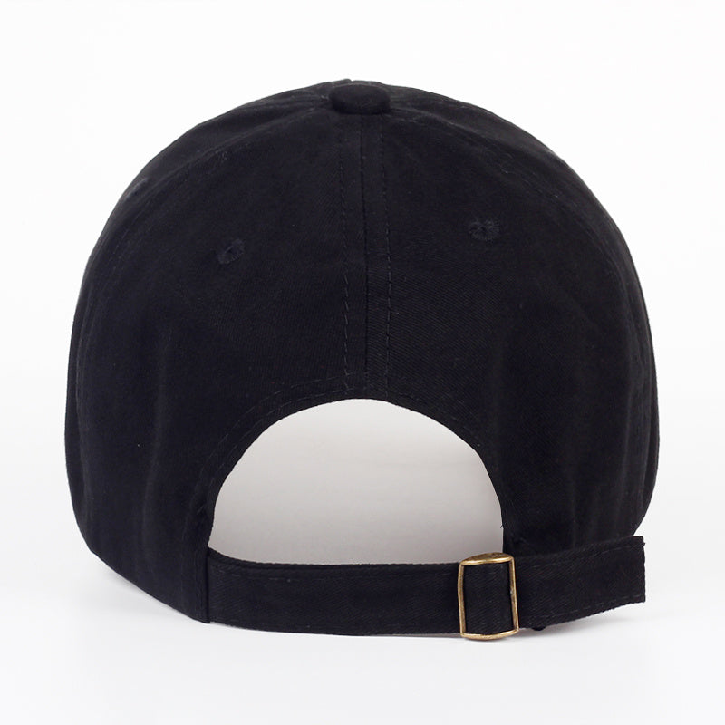 a black hat with a gold buckle
