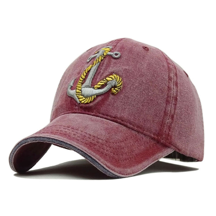a red hat with a anchor on it