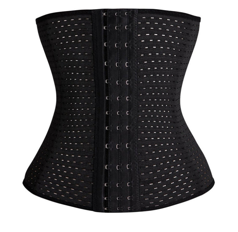 a black corset with silver rings