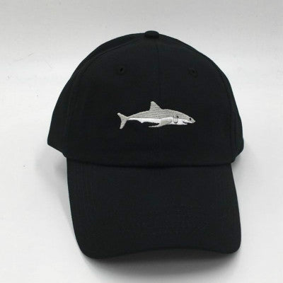 a black baseball hat with a shark on it