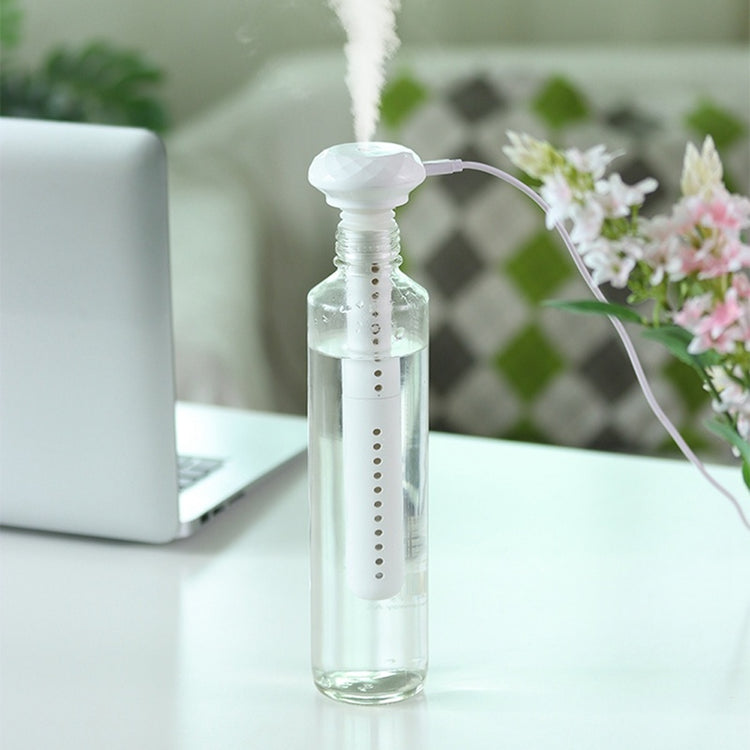 a bottle with a vaporizer