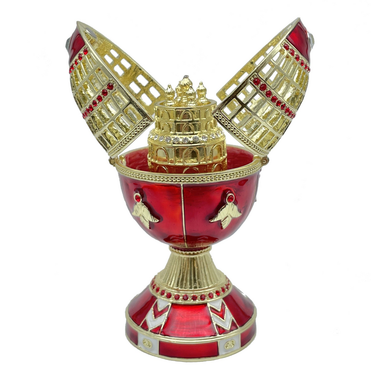 a red and gold object with open lid