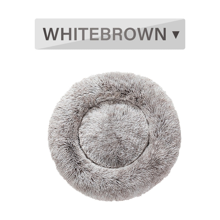 a round grey pillow with text above