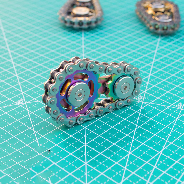 a group of gears on a green surface
