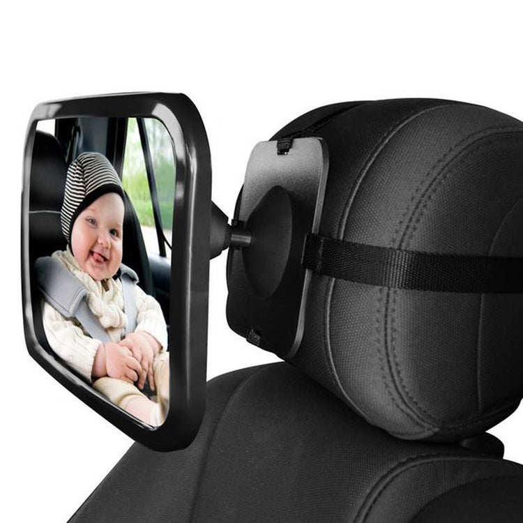 a mirror on the back of a car seat