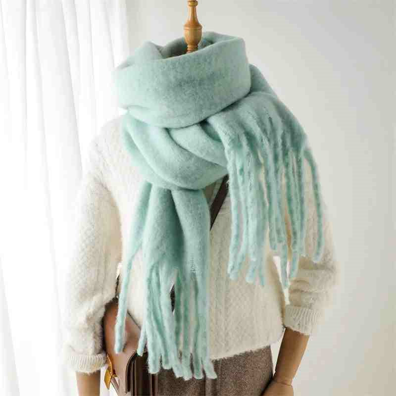 a mannequin wearing a scarf
