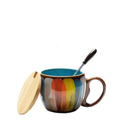 a mug with a spoon in it