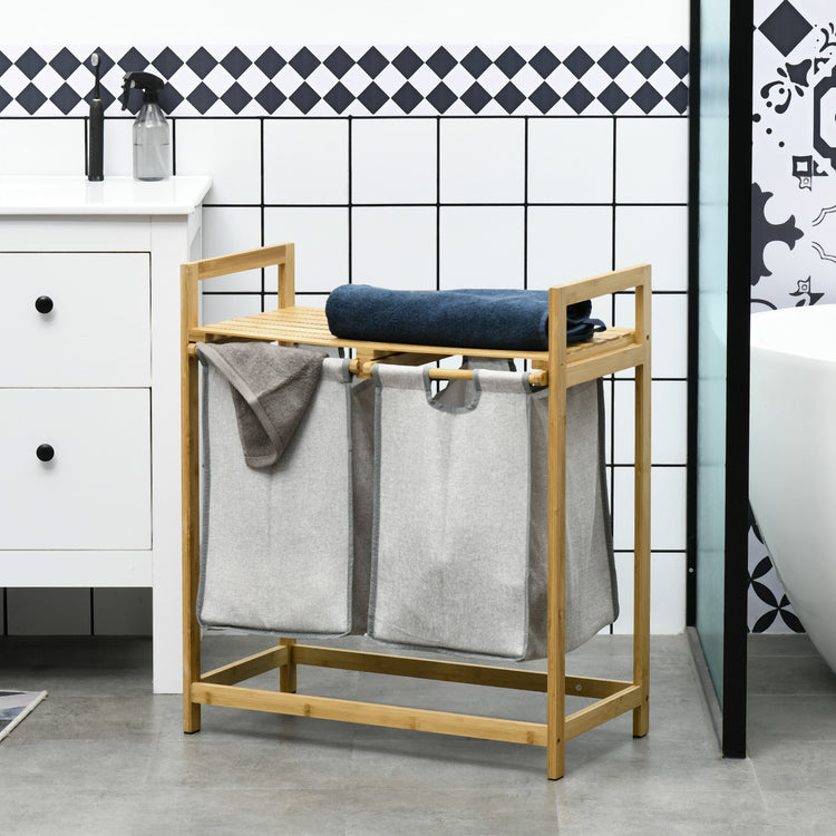 a wood rack with two laundry bags