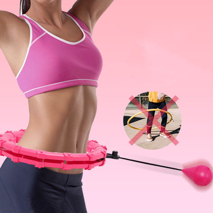a woman with a hoop around her waist