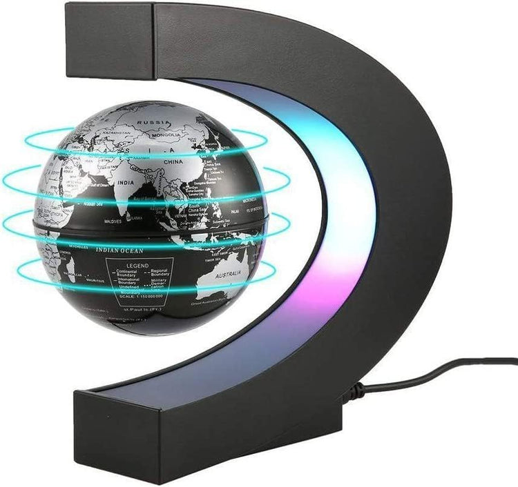 a black and silver object with a globe in the middle