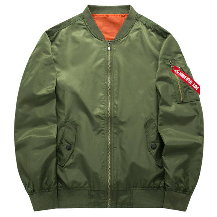 a green bomber jacket with a red label