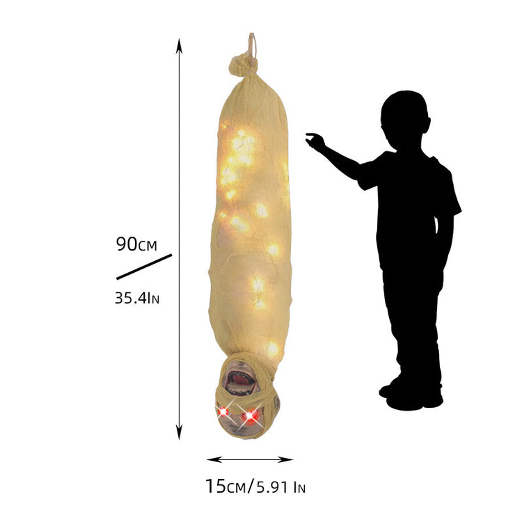 a child standing next to a bag with lights