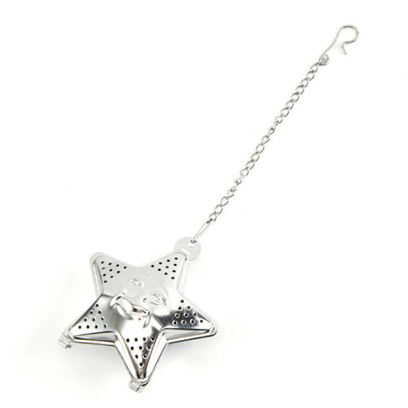 a silver star shaped tea strainer