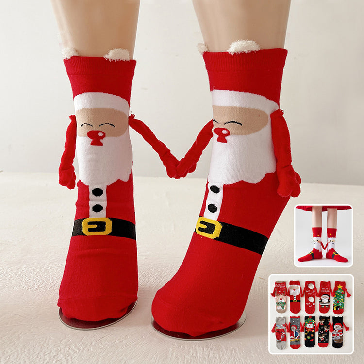 a pair of feet wearing santa socks