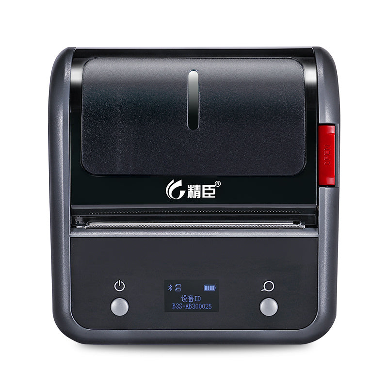 a black machine with a button and a red button