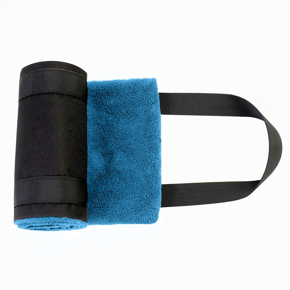 a blue and black towel rolled up