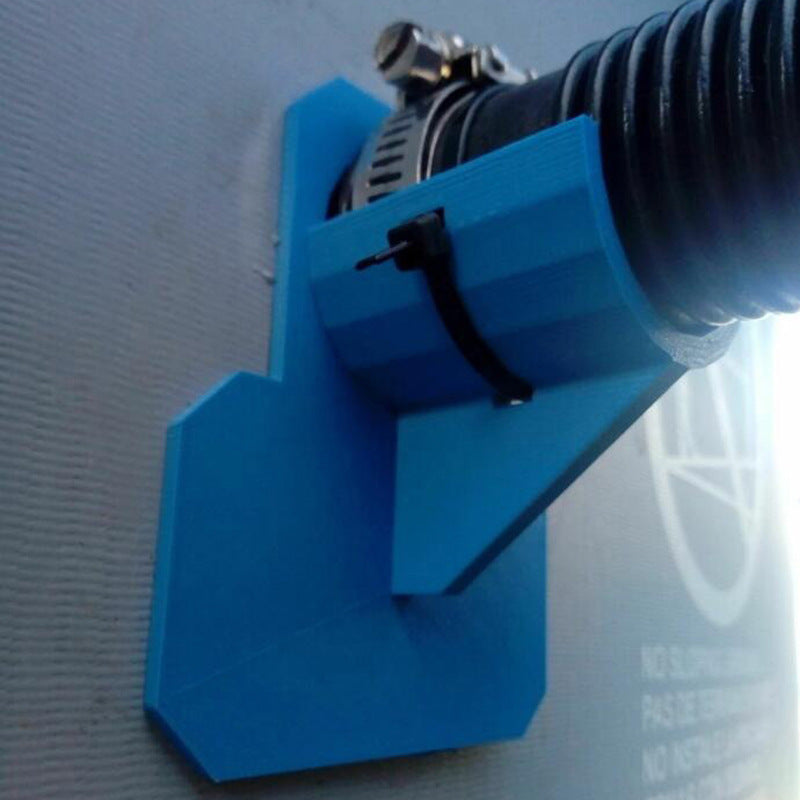 a blue hose attached to a blue wall