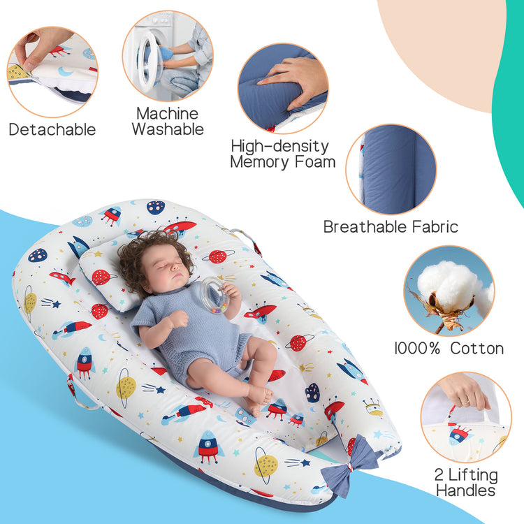 a baby sleeping in a baby bed