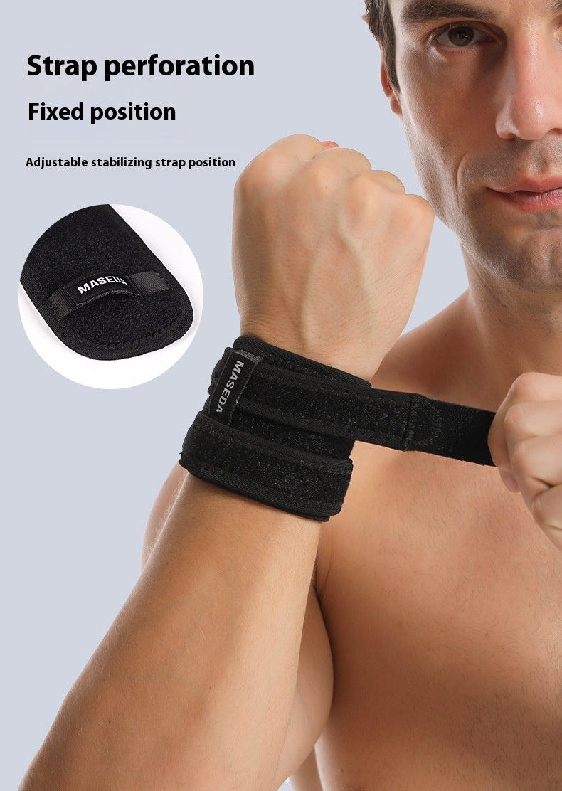 a man wearing a black wrist band
