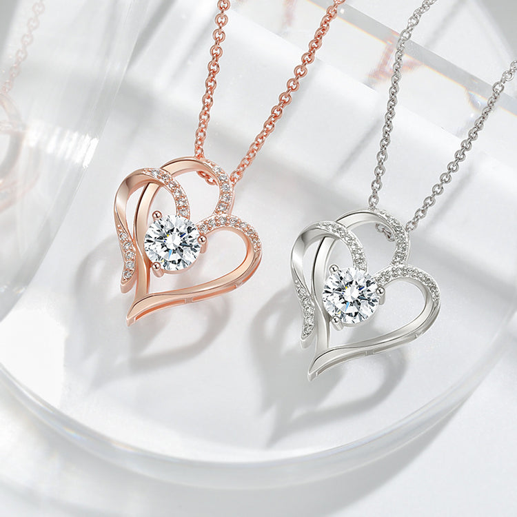 a pair of necklaces with diamonds