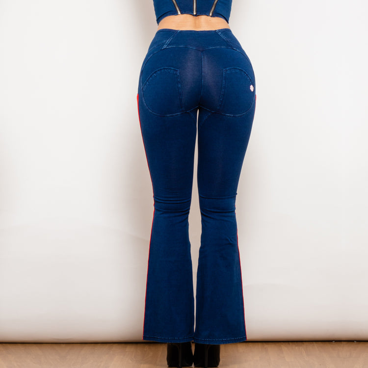 a woman wearing blue jeans