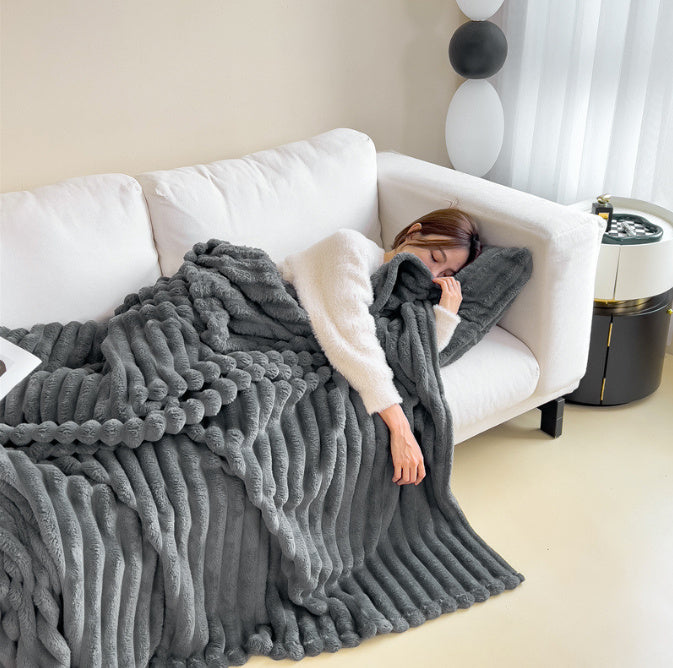 a woman sleeping on a couch
