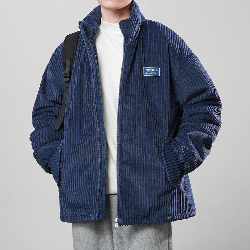 a boy in a blue jacket