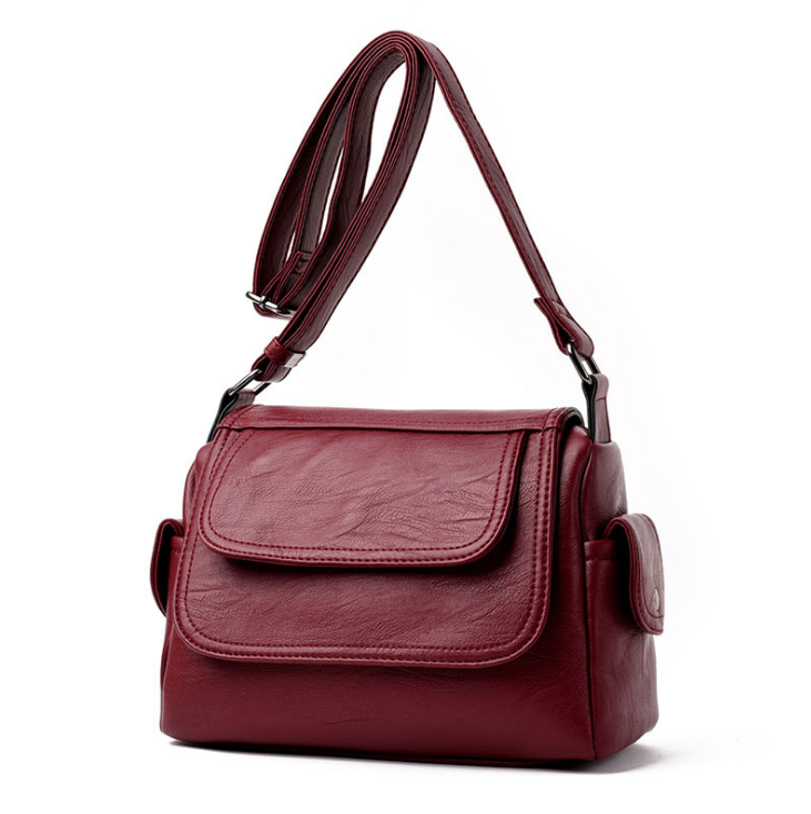 a red purse with a strap