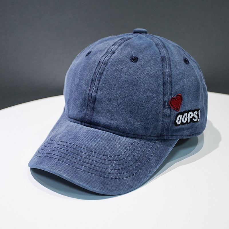 a blue hat on a white table