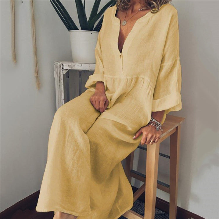 a woman sitting on a stool