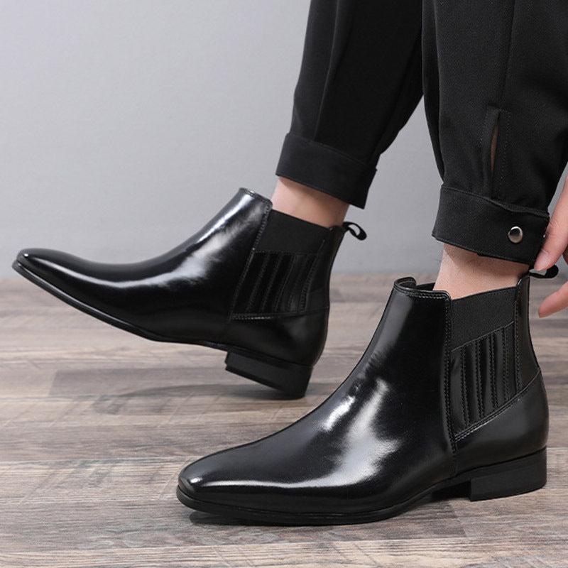 a person wearing black shoes