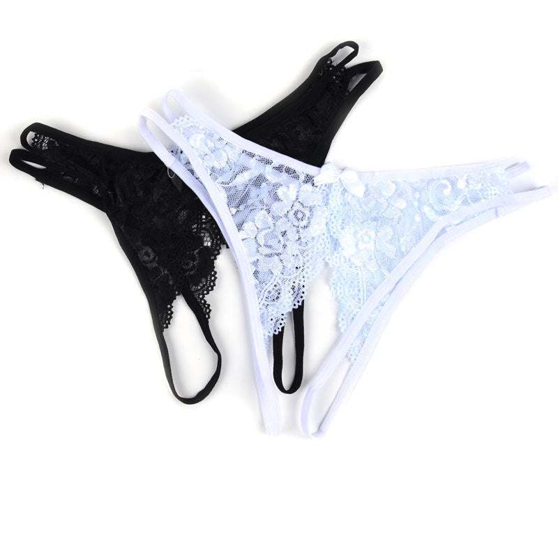 a pair of black and white thongs