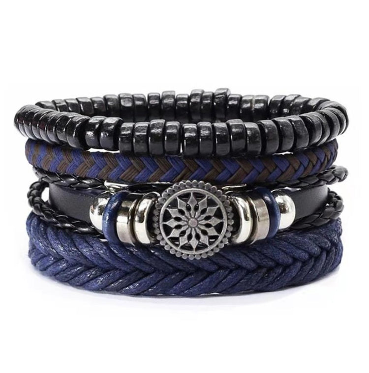 a stack of bracelets on a white background