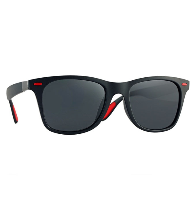 a black sunglasses with red accents