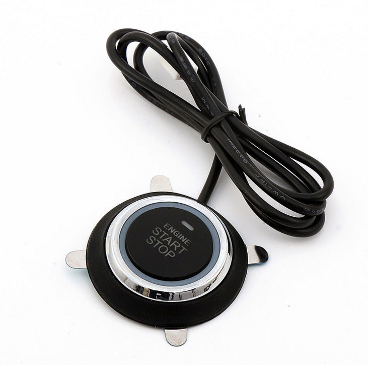a black and silver start stop button