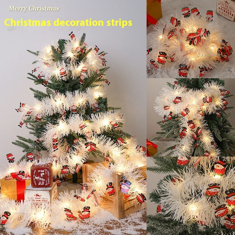 a christmas tree with lights and ornaments