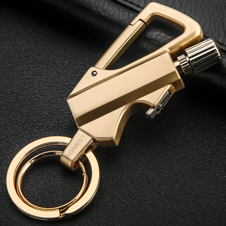 a key chain on a leather surface