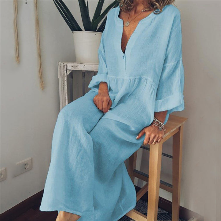 a woman sitting on a stool