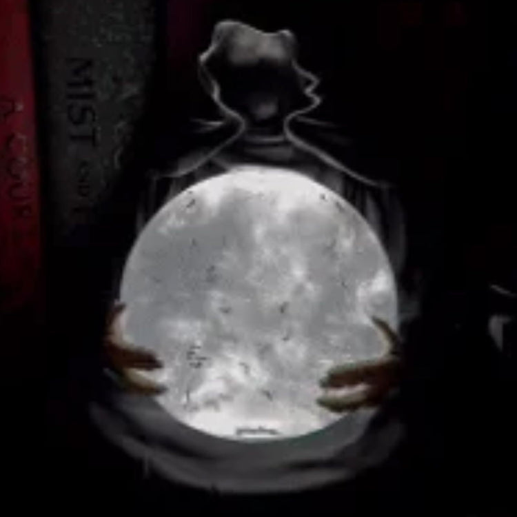 a person holding a moon