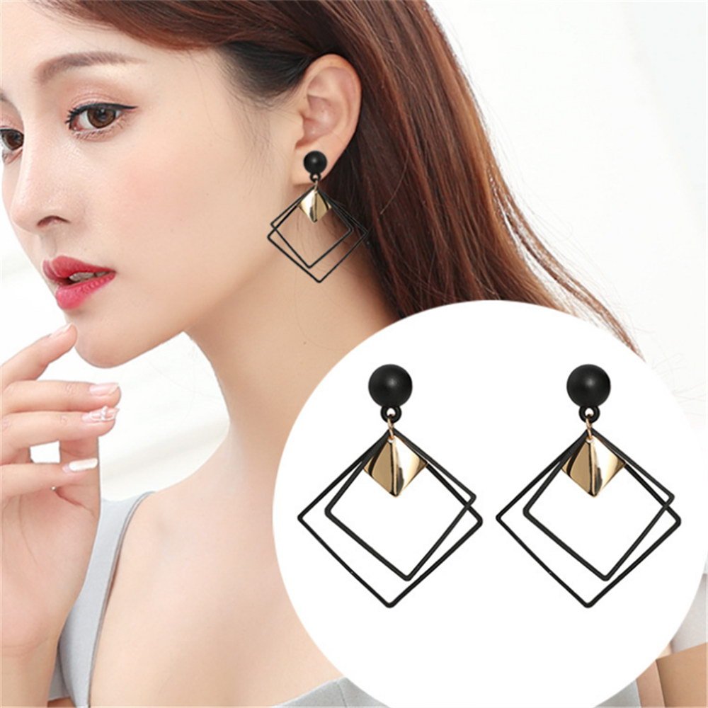 a woman wearing earrings and a picture of her face