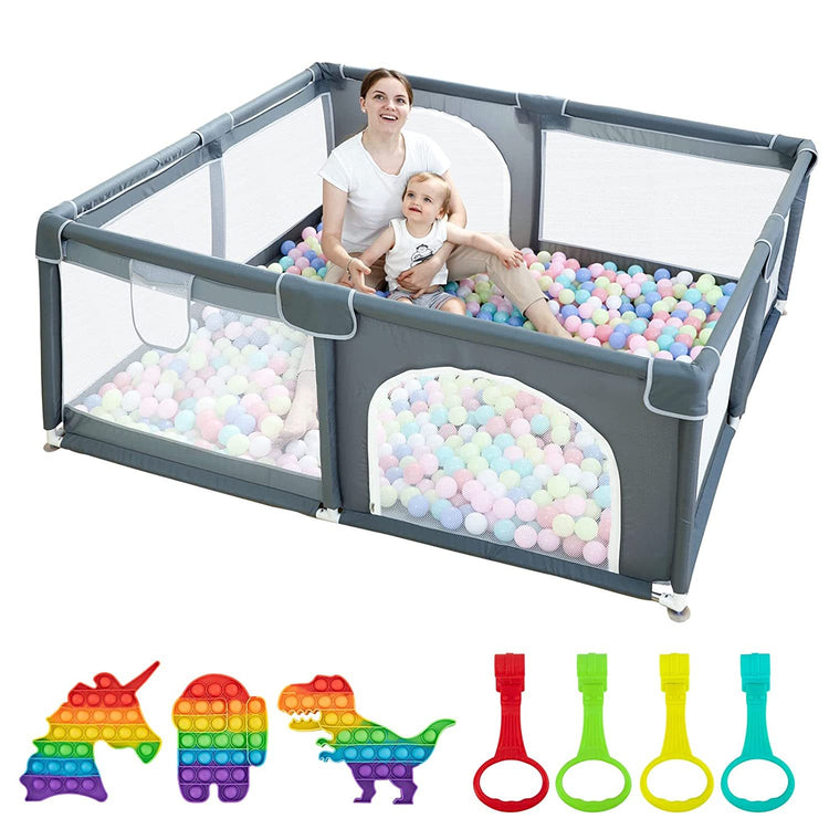 a woman and a child in a ball pit