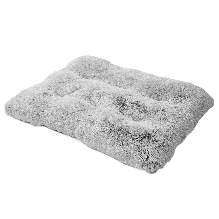 a white fluffy pillow on a white background