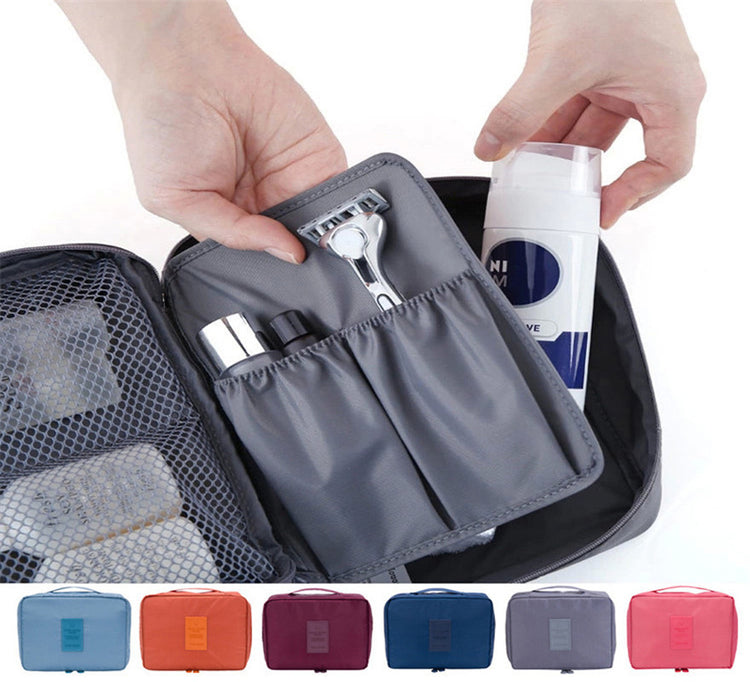 a person's hand holding a bag with a razor and shaving cream