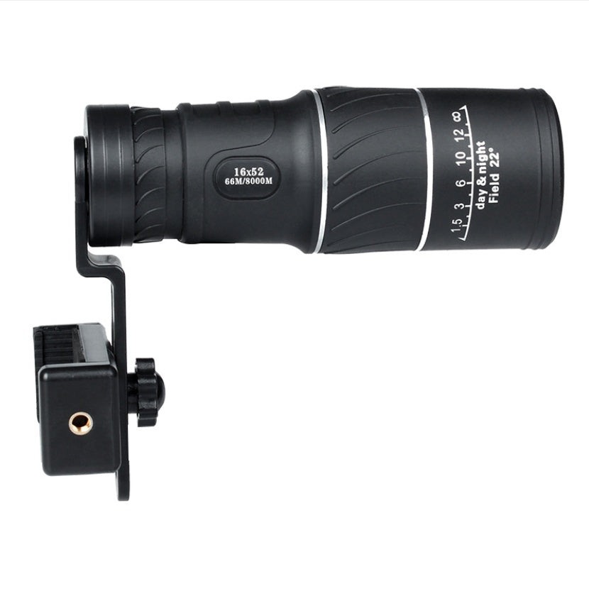 a black telescope with a white background