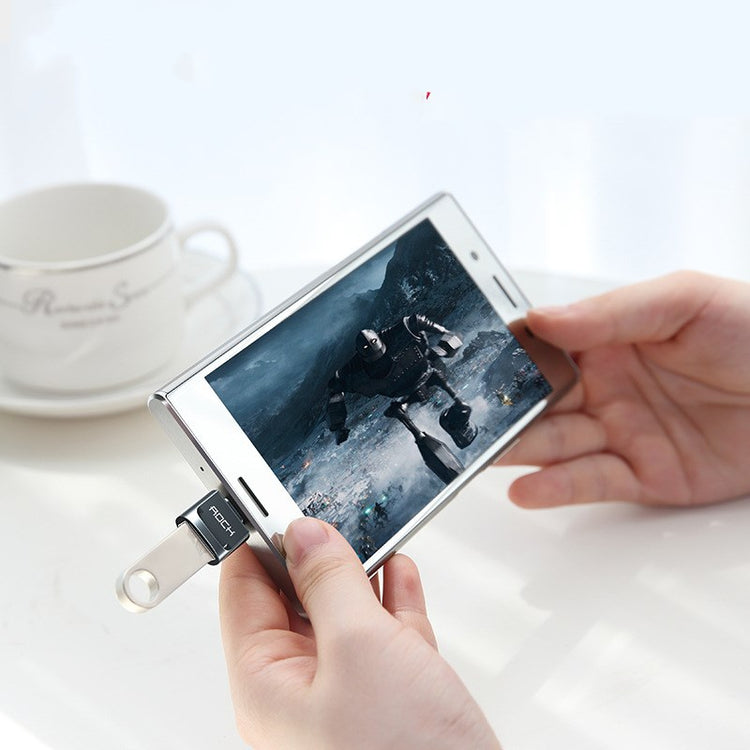 a person holding a cell phone