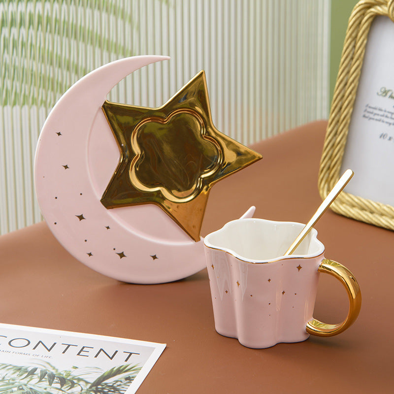 a cup and spoon on a table